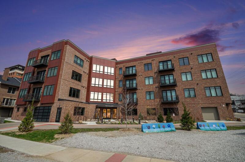 Evening photo of The Galley Condo building in downtown Ann Arbor