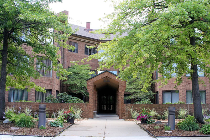 The main entrance to one of the Nature Cove condo buildings