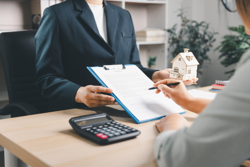 Person signing paperwork for an escrow account